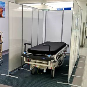 Medical laminate screens used to create a private medical space.