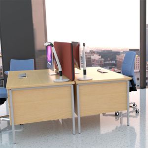 Nova acoustic desk screens at 600mm high in red fabric and fitted between 2 desktops.