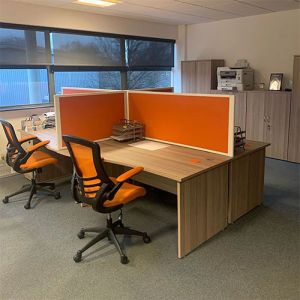 Safeguard Desktop Screens with orange anti-bacterial fabric used in an office setting